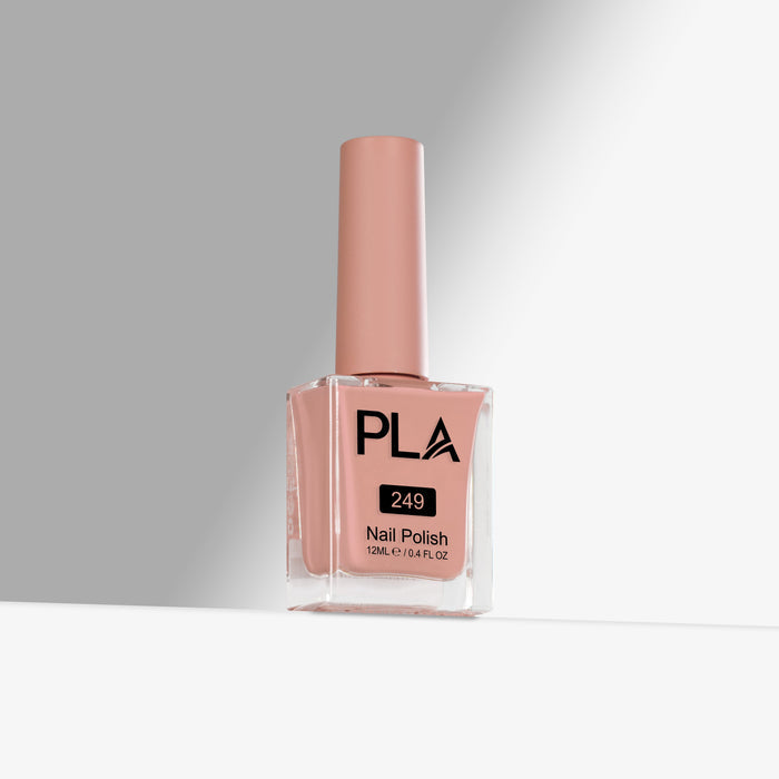 Nail polish bottle with 'PLA' branding on a gray background